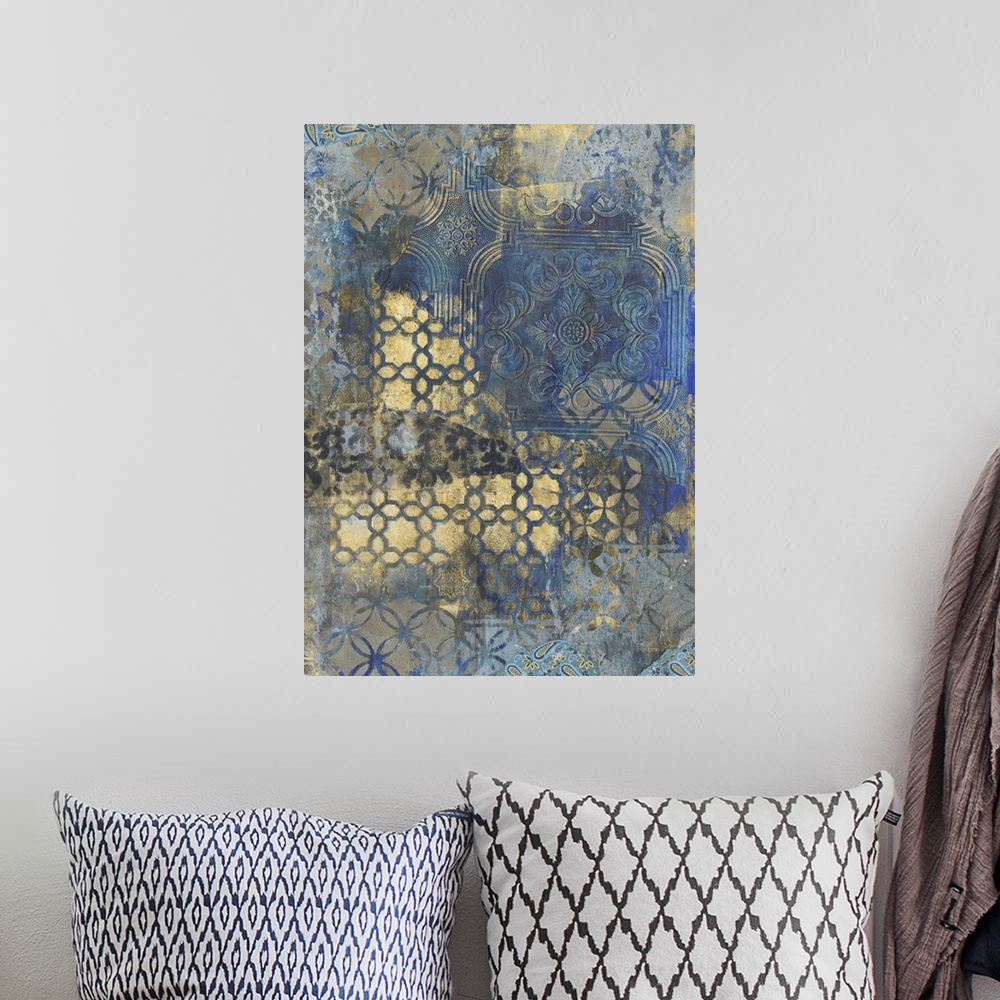 A bohemian room featuring Contemporary pattern home decor artwork of gold ornate patterns against a dark blue background.