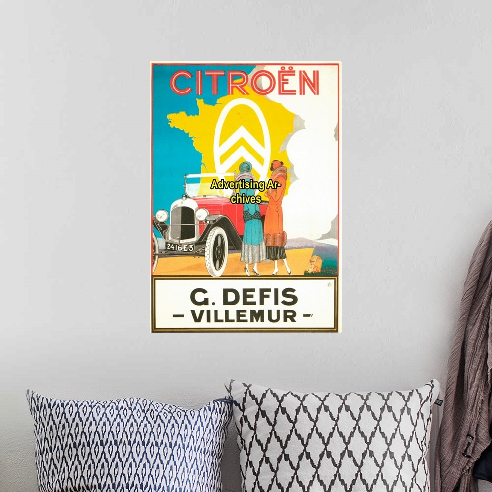 A bohemian room featuring 1920's France Citroen Poster