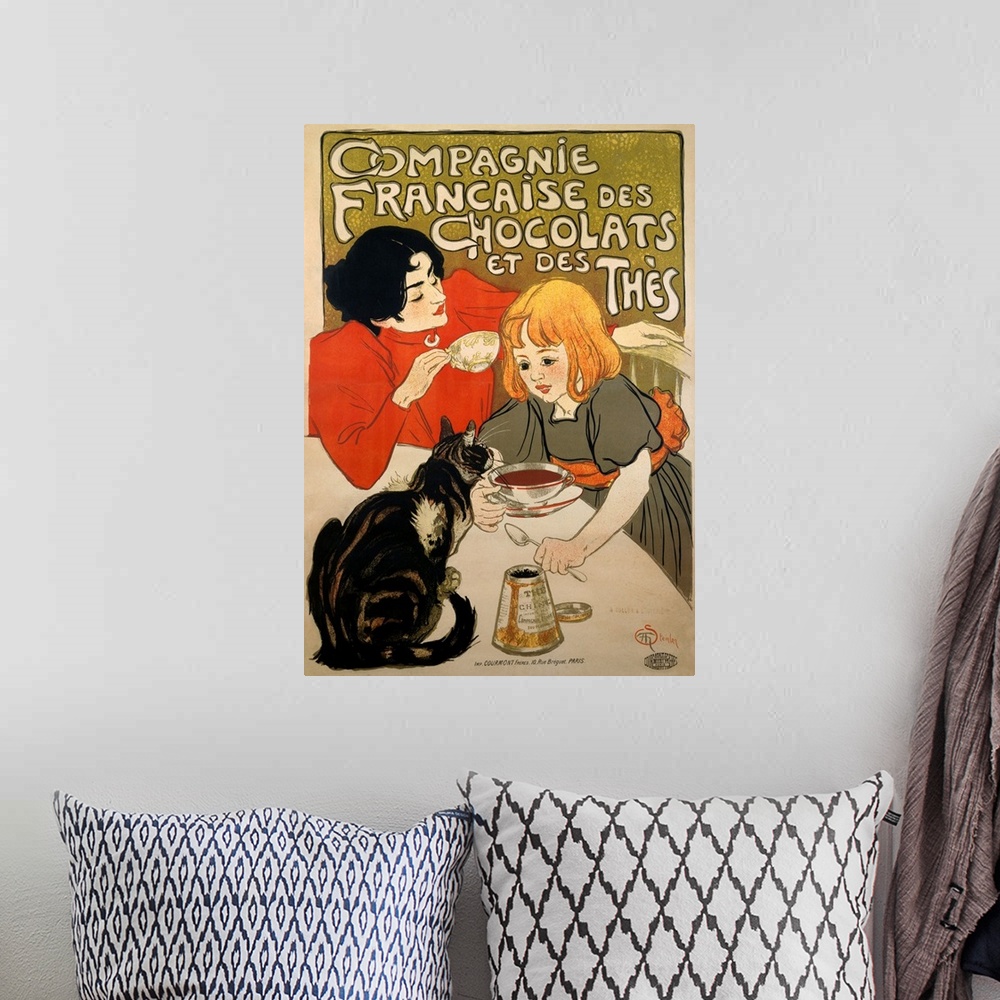 A bohemian room featuring Old advertising poster with a mother and daughter sitting at a table drinking hot chocolate.  The...
