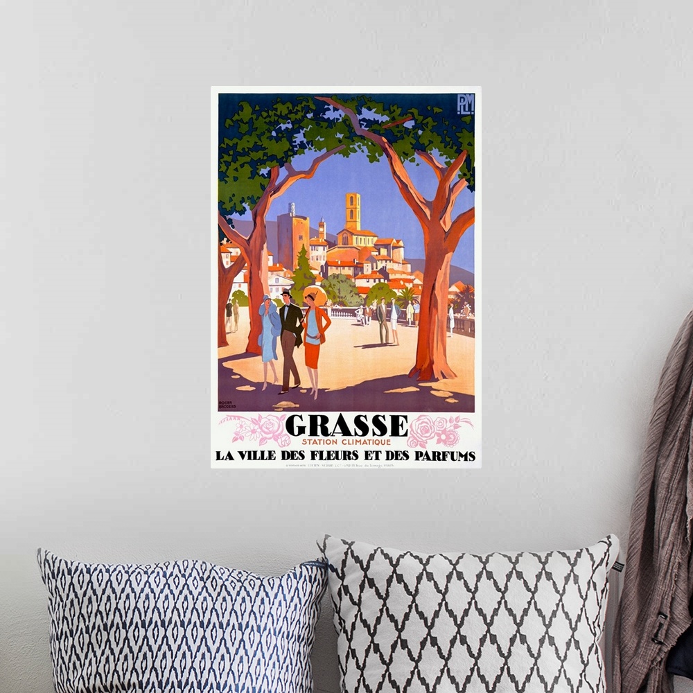 A bohemian room featuring Old print advertising vacation travel.  A colorful image of a city is seen from between two huge ...