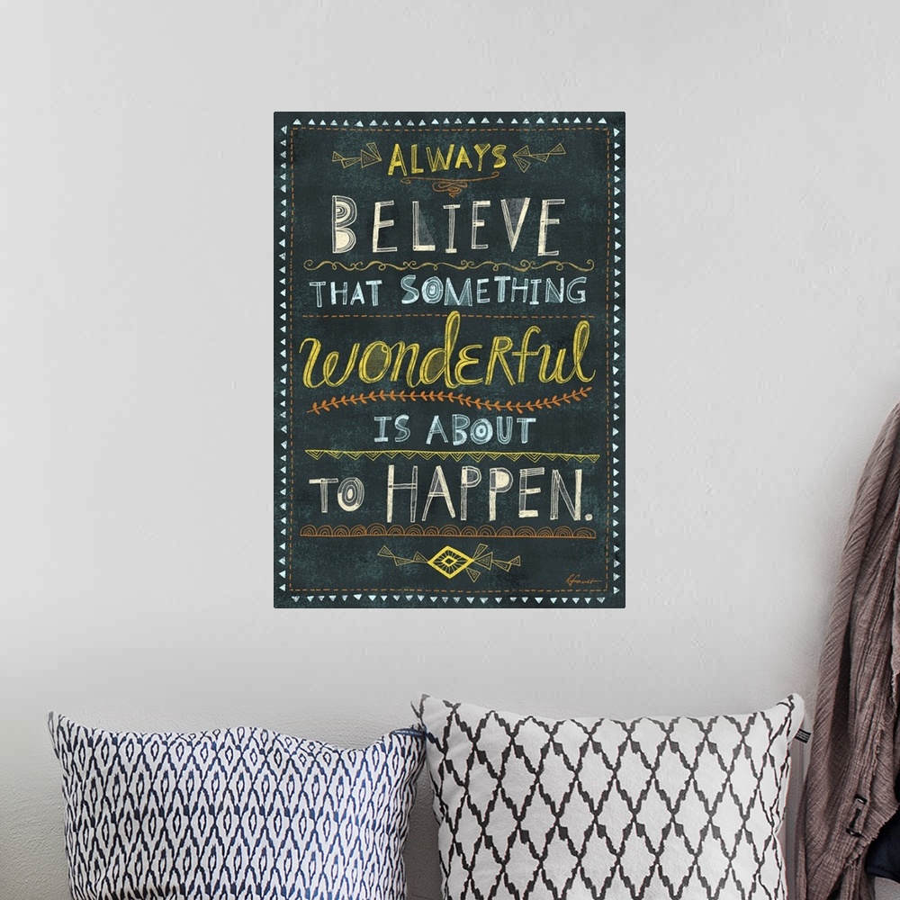A bohemian room featuring Contemporary artwork with a retro feel of motivational text against a dark background.