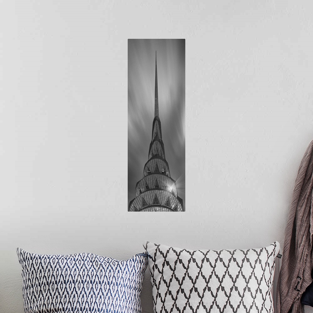 A bohemian room featuring A photograph of the Chrysler building taken in black and white.