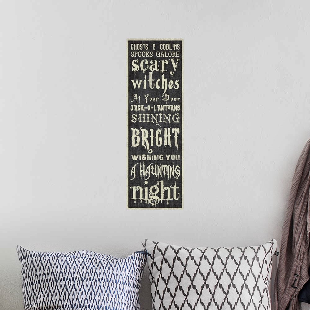 A bohemian room featuring Halloween Sign