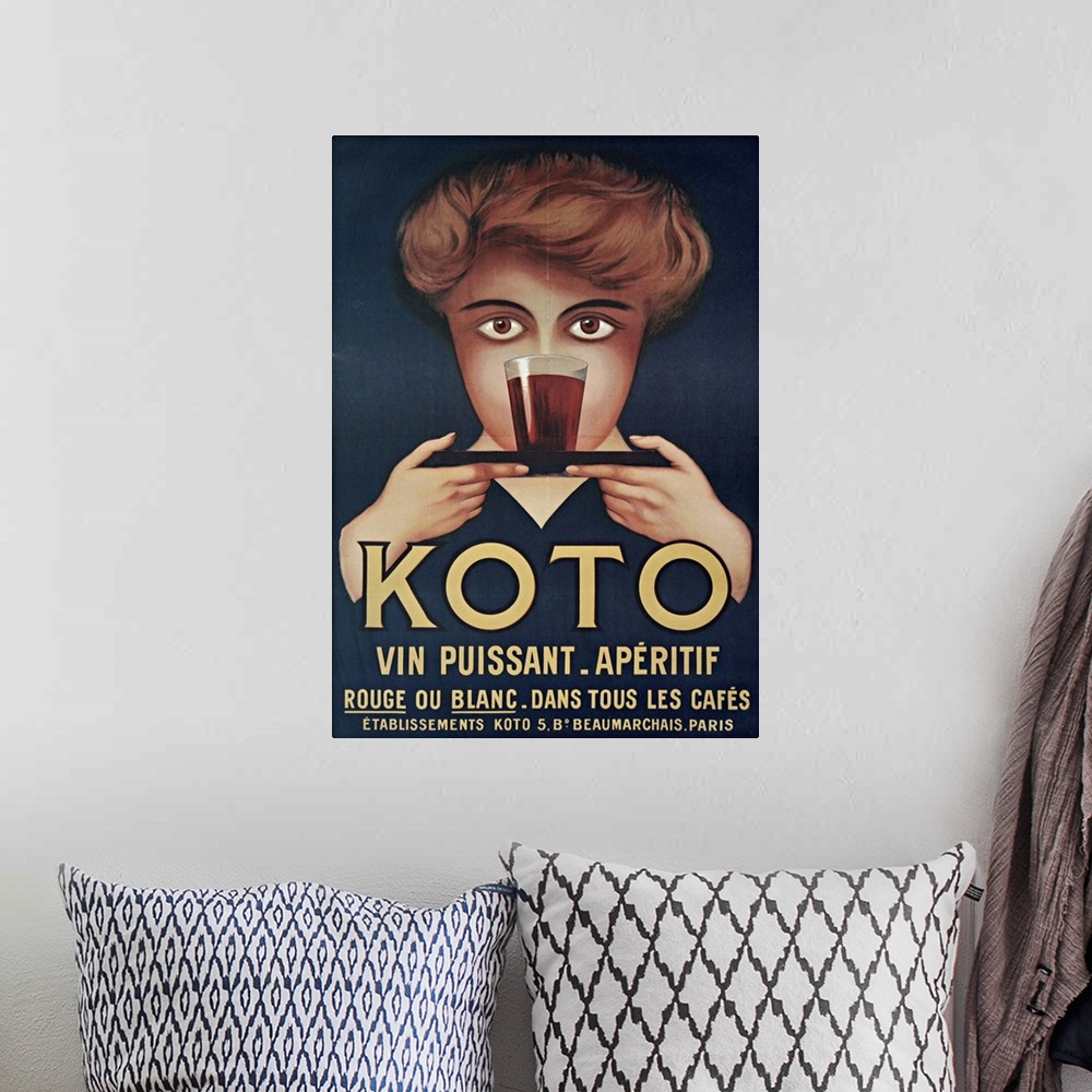 A bohemian room featuring Vintage poster advertisement for Koto.