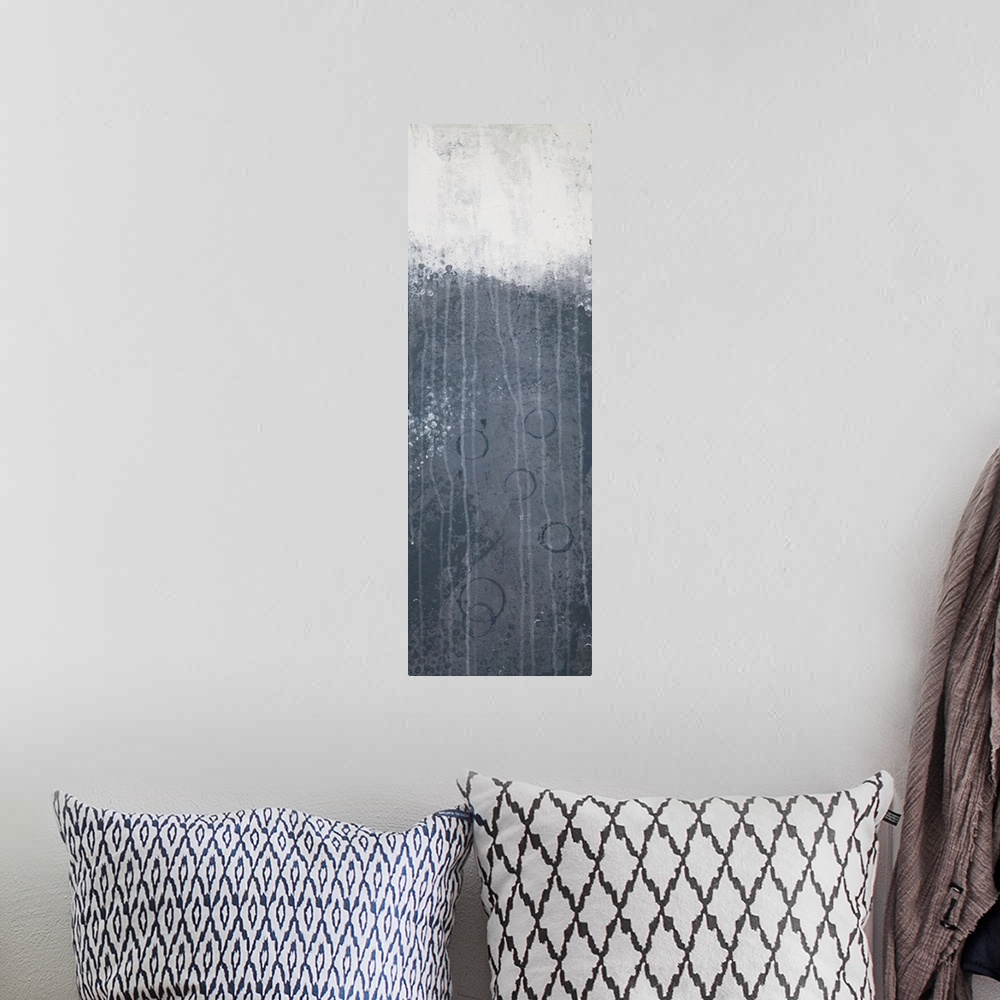 A bohemian room featuring Contemporary abstract painting in dark grey and white.