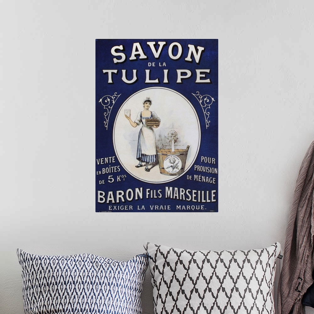 A bohemian room featuring Vintage poster advertisement for Savon Tulipe.