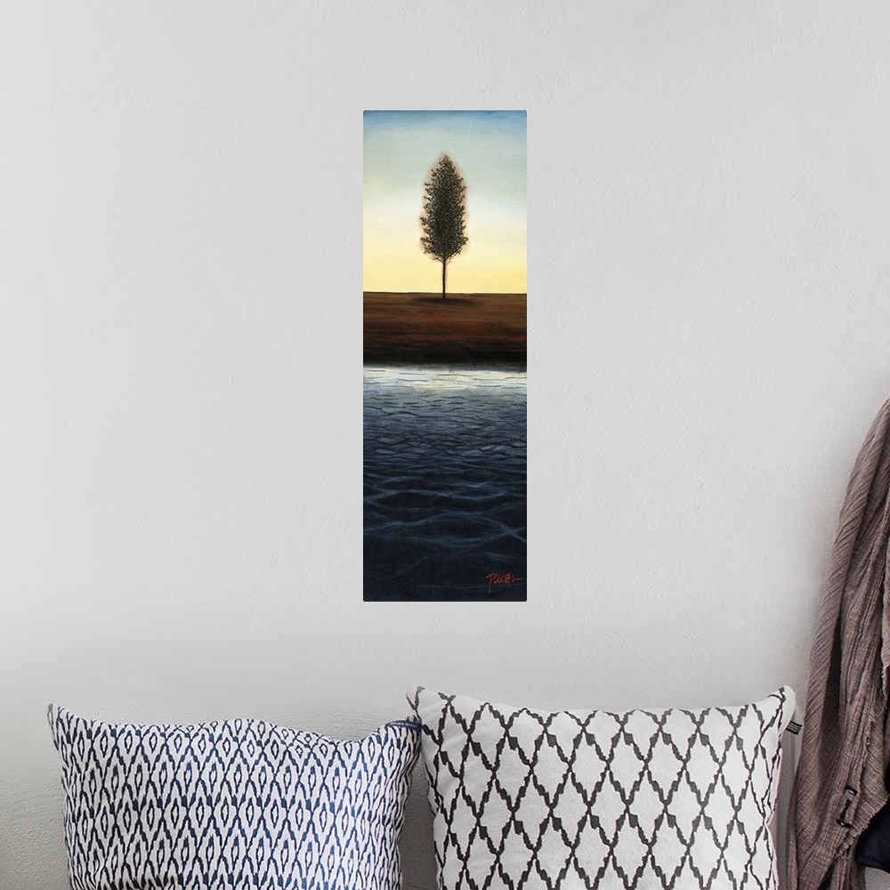 A bohemian room featuring A long vertical painting of a single tree next to a body of water with the sun setting behind it.