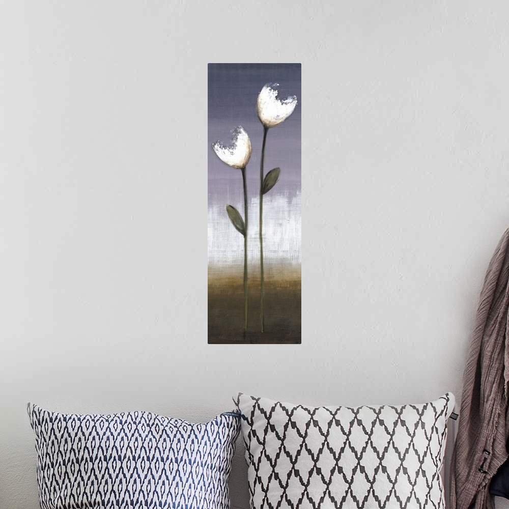 A bohemian room featuring A long vertical painting of two white flowers on a long stem with a textured neutral background.