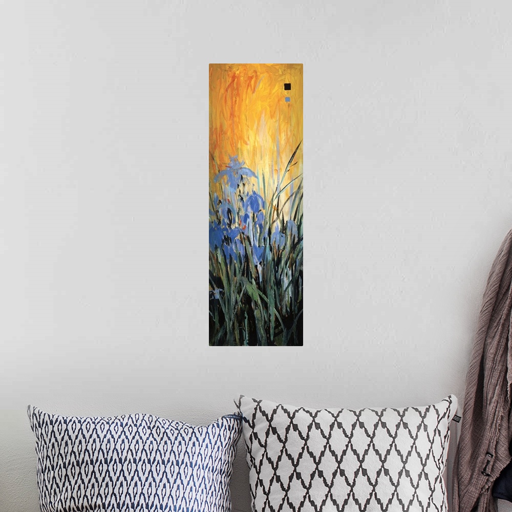 A bohemian room featuring A contemporary painting with blue flowers with long grass and a bright orange background.