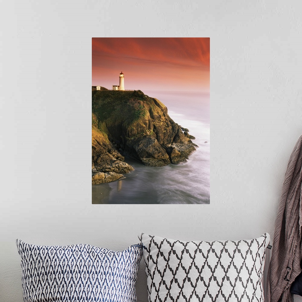 A bohemian room featuring USA, Washington State, Fort Canby State Park, View of North Head Lighthouse on cliff.