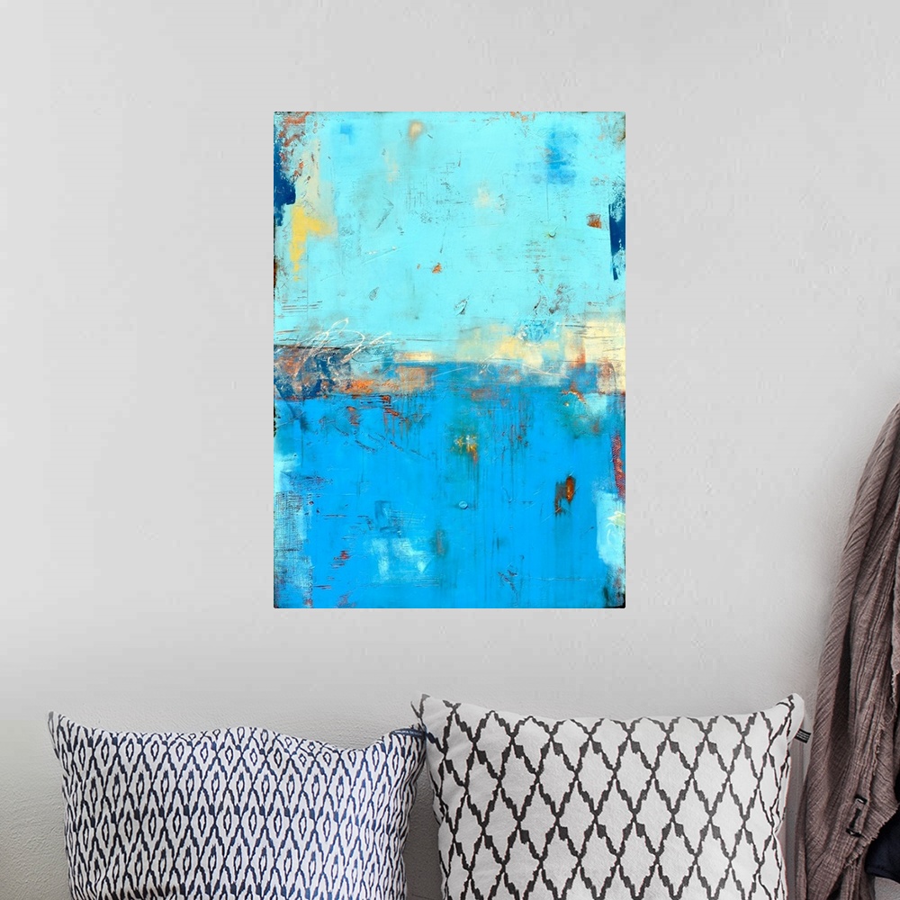 A bohemian room featuring Contemporary abstract painting using blue tones mixed with earthy tones.