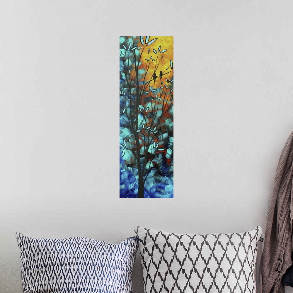 A bohemian room featuring Vertical and narrow canvas painting of two birds sitting on a tree branch at sunset.