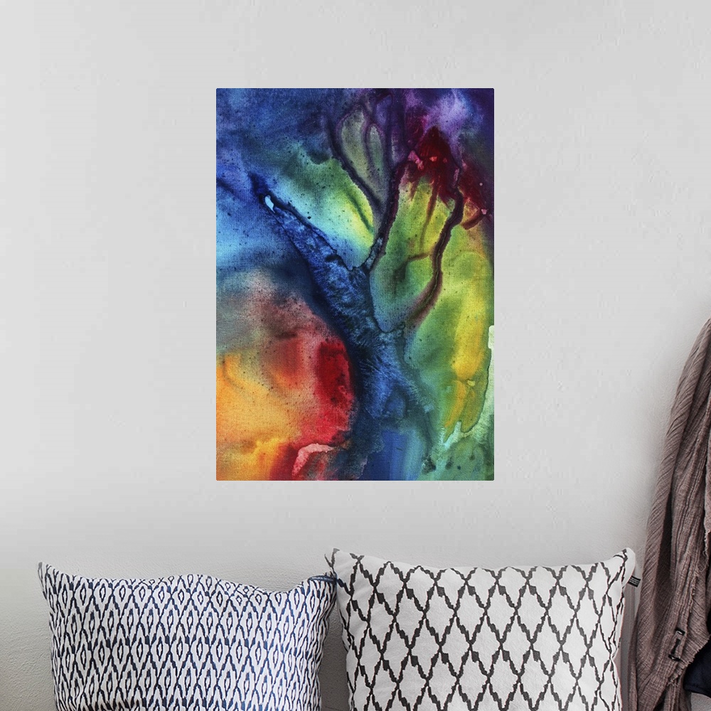 A bohemian room featuring Abstract artwork that has fluid colors of reds, yellows, magenta, violet and blue accented with b...