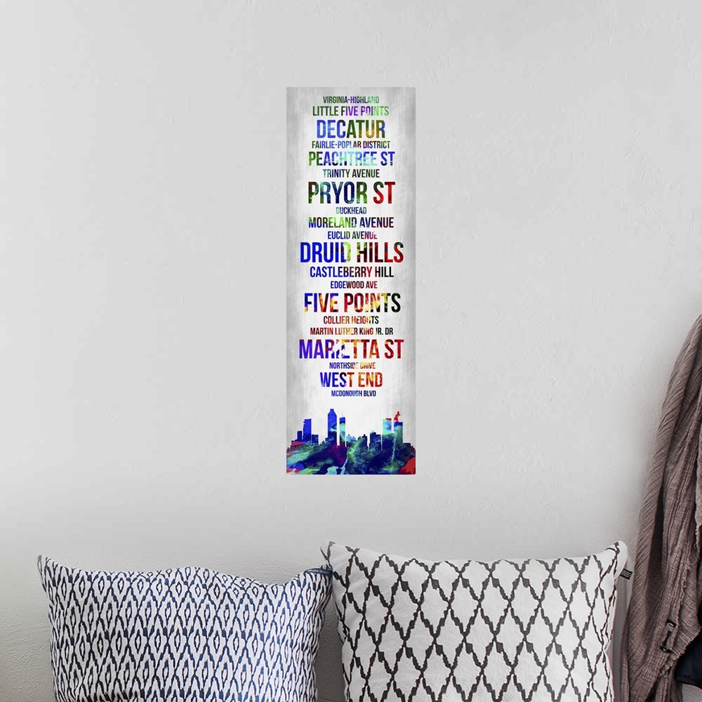 A bohemian room featuring Contemporary watercolor bus roll art incorporating the Atlanta city skyline.