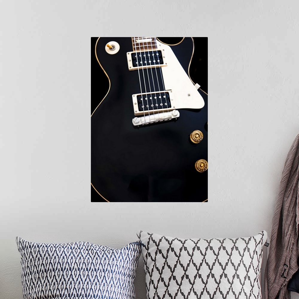 A bohemian room featuring Gibson Les Paul