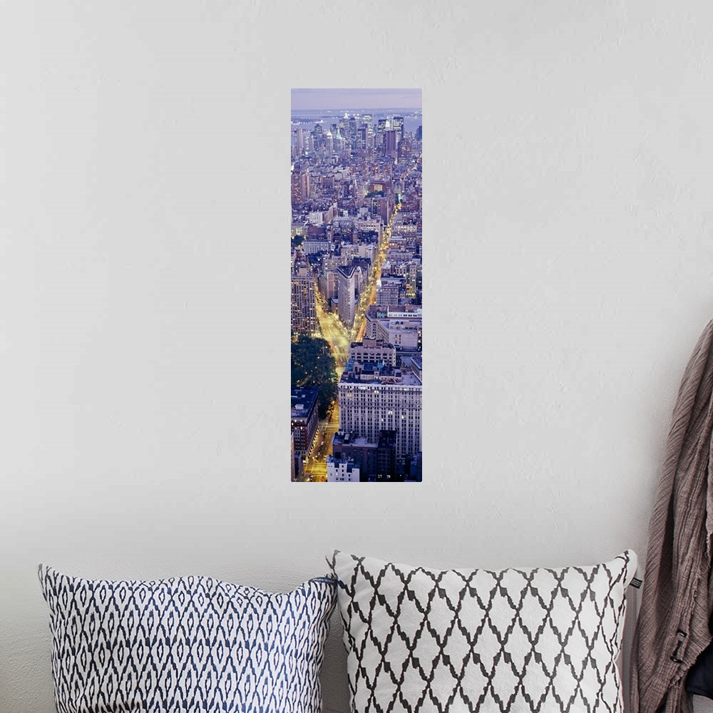 A bohemian room featuring Tall panoramic piece of an aerial photograph taken of the skyline in Manhattan during dusk with t...