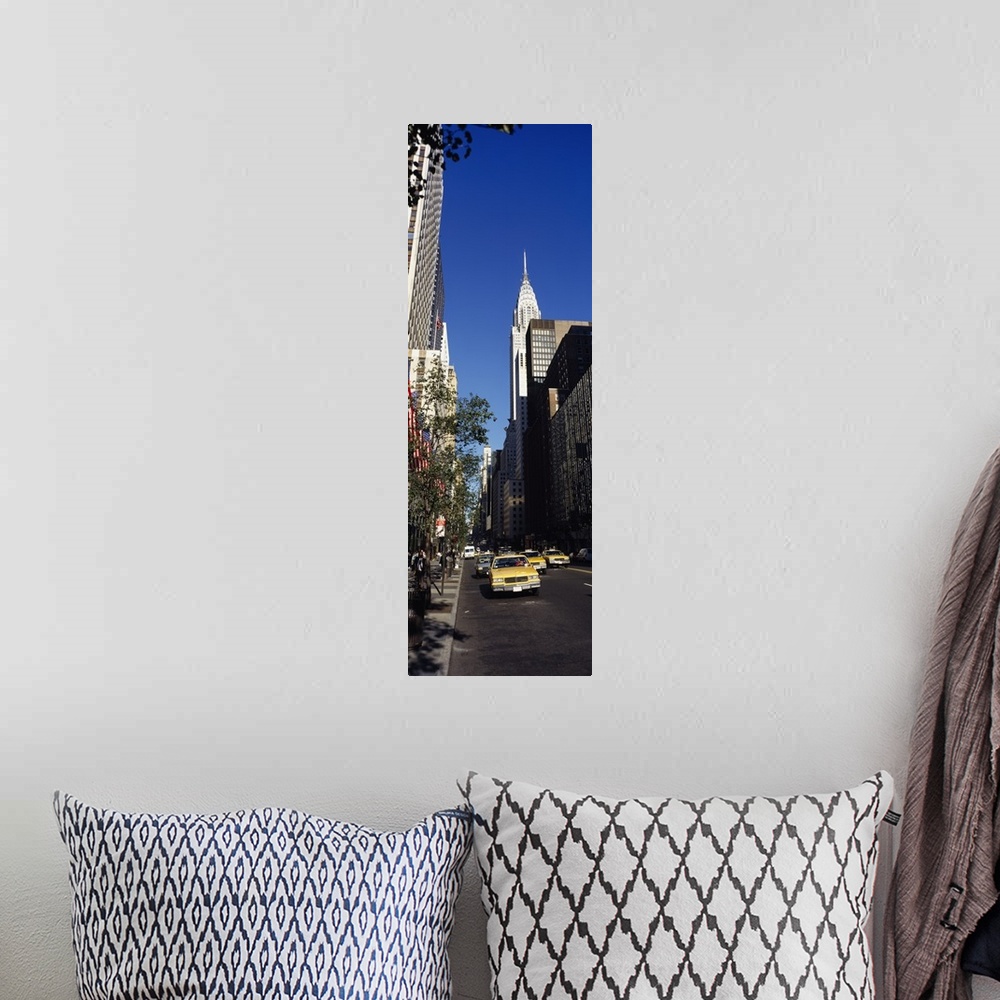 A bohemian room featuring Buildings along a road, Chrysler Building, Manhattan, New York City, New York State