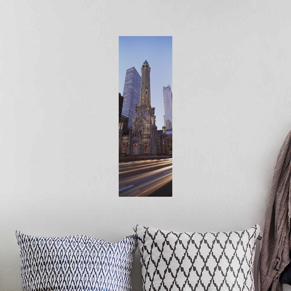 A bohemian room featuring Vertical panoramic photograph of skyscrapers and tall buildings along city street.