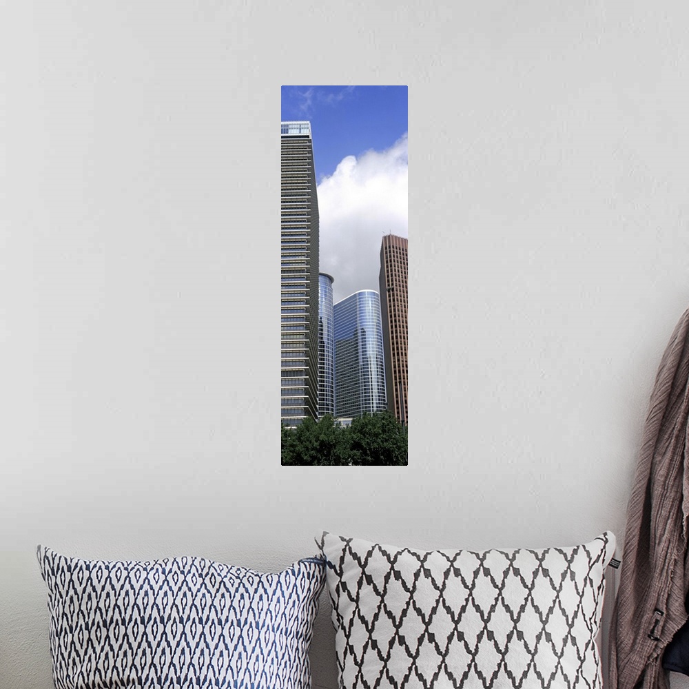 A bohemian room featuring Low angle view of buildings in a city, Wedge Tower, Chevron Building, Houston, Texas