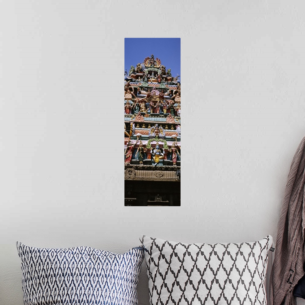 A bohemian room featuring Low angle view of statues of Hindu gods on the roof of a temple, Arulmigu Kapaleeswarar Temple, C...