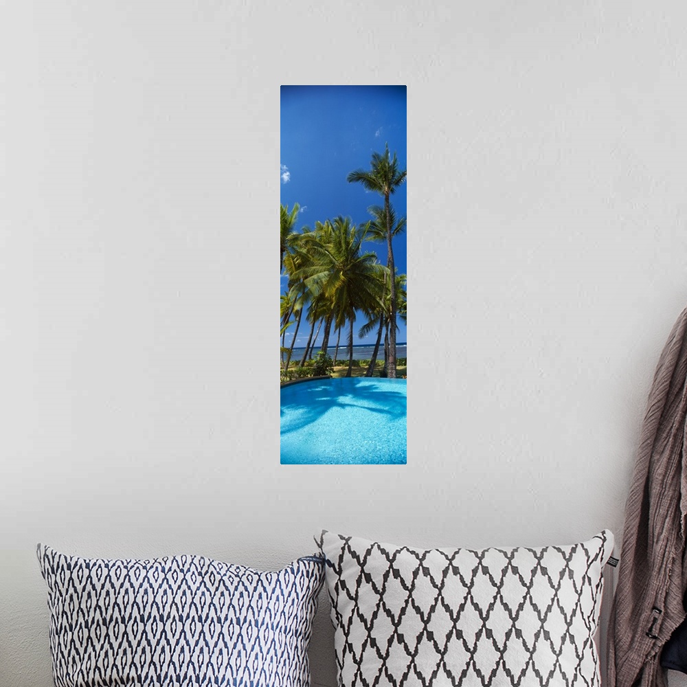 A bohemian room featuring Palm trees near a swimming pool Maui Hawaii