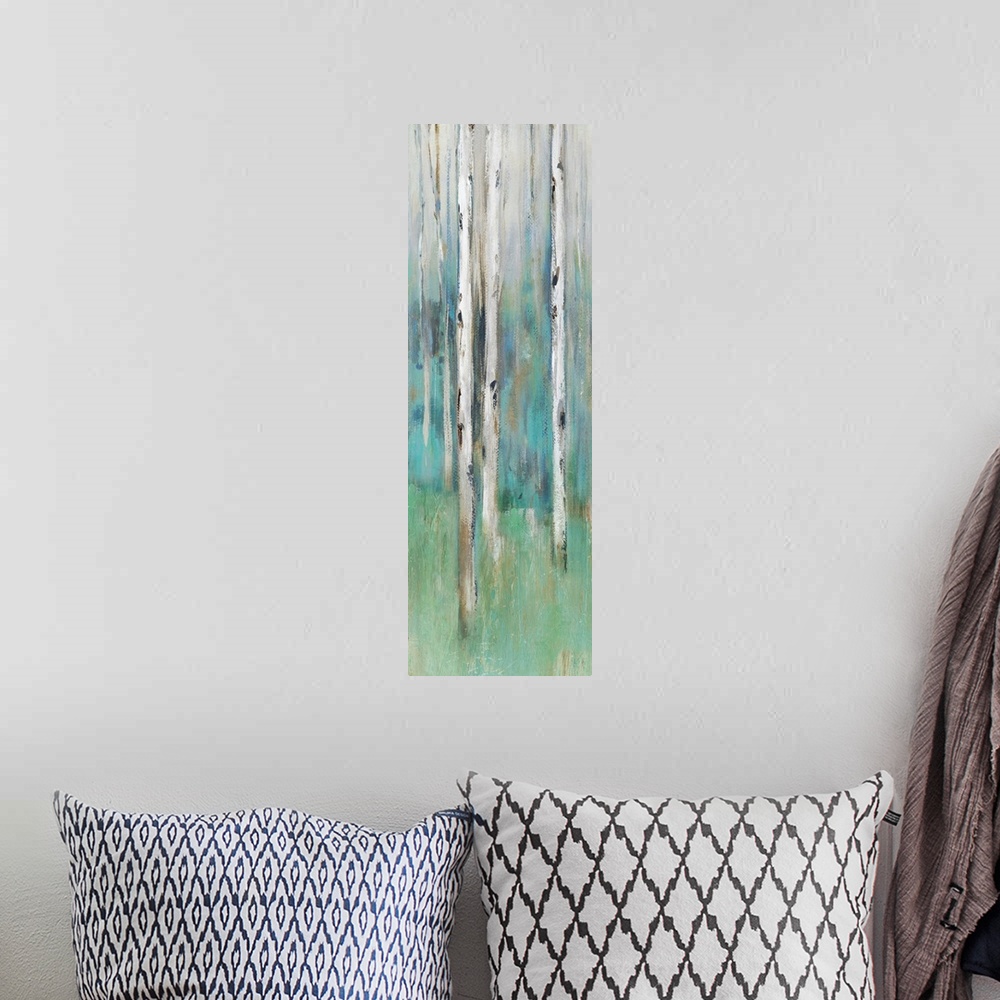 A bohemian room featuring Abstract painting of a forest in muted blues and greens.