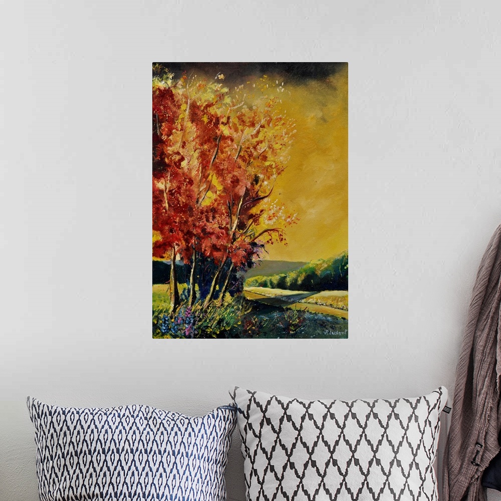 A bohemian room featuring Vertical painting of lively orange leaved  trees on an autumn day.