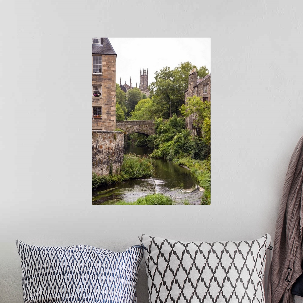 A bohemian room featuring Beautiful photograph of Water of Leith river flowing through Edinburgh architecture and under a b...