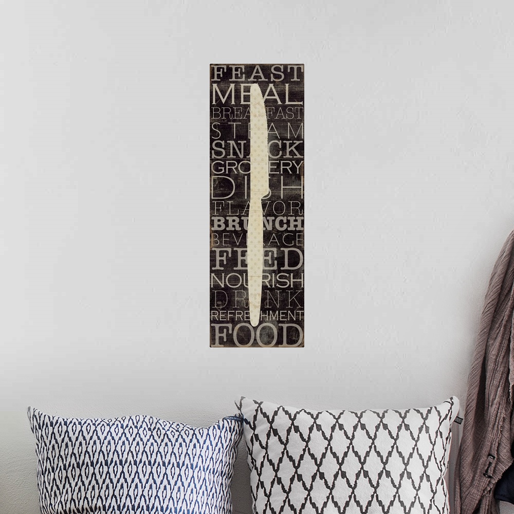 A bohemian room featuring Vertical panoramic artwork of a butter knife silhouette with text in the background.  Some of the...