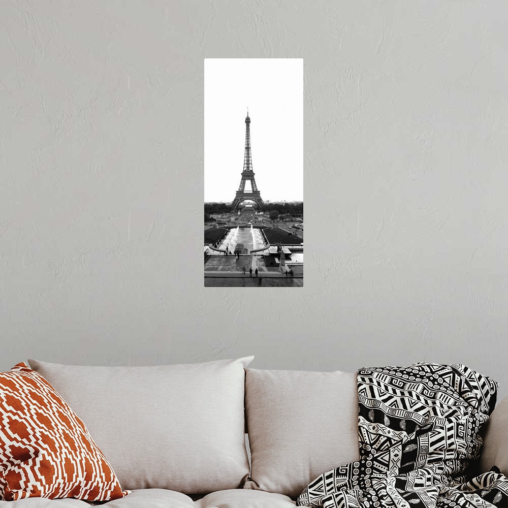 A bohemian room featuring Black and white photograph of the Eiffel Tower as seen from the edge of the plaza. The tower cont...