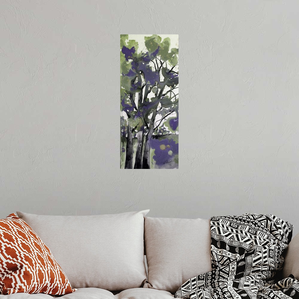 A bohemian room featuring Tall panel abstract painting resembling trees with black and gray trunks and purple and green bus...