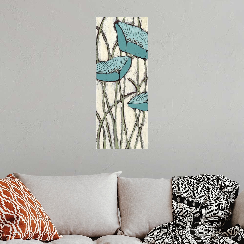 A bohemian room featuring Vertical painting of a group of blue poppies against a neutral backdrop.