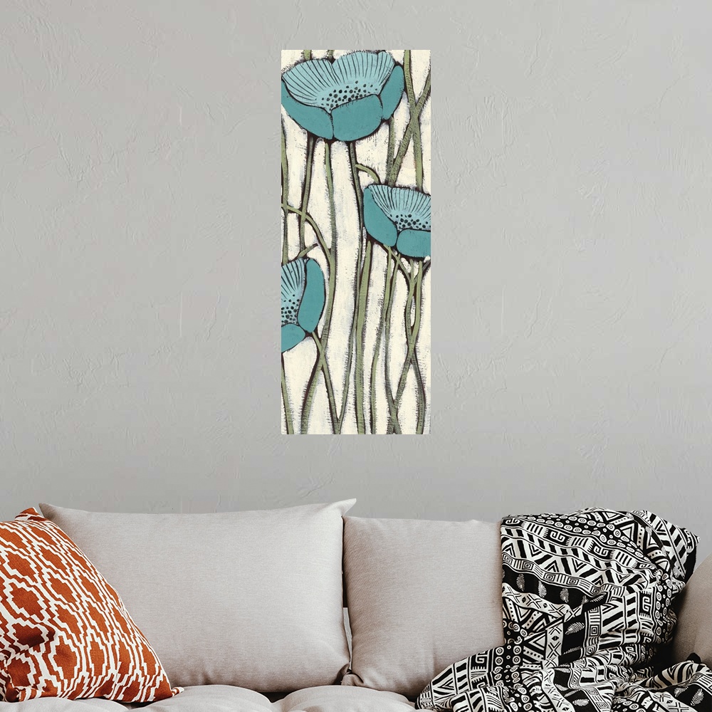 A bohemian room featuring Vertical painting of a group of blue poppies against a neutral backdrop.