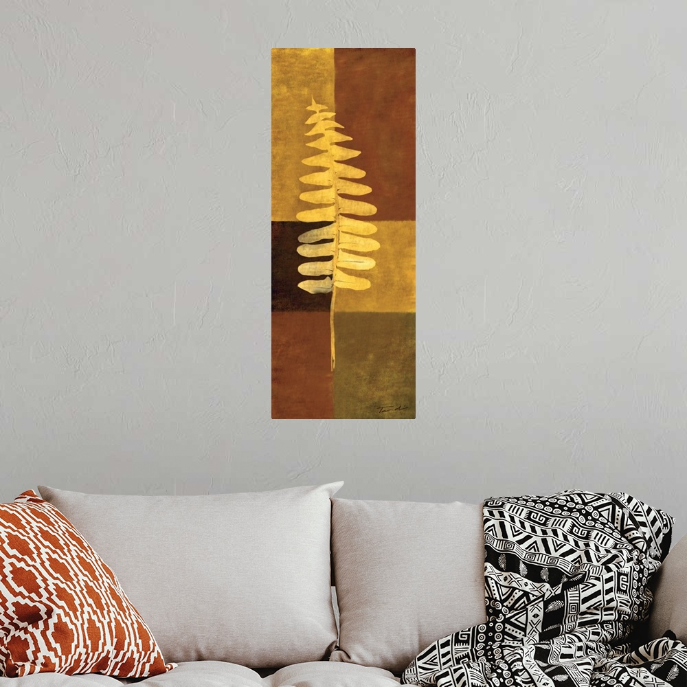 A bohemian room featuring Long vertical decorative art of a single fern leaf in gold with a checkered earth toned background.