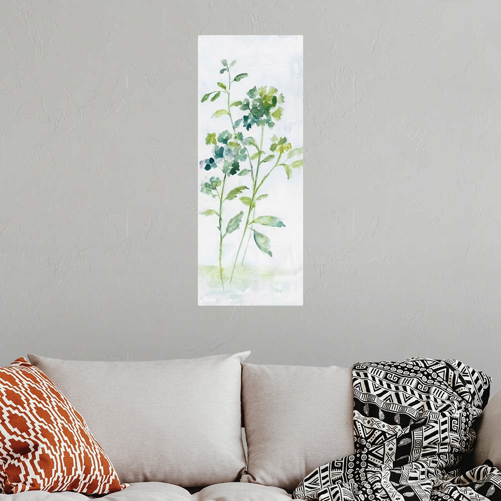 A bohemian room featuring Large watercolor abstract painting of flowers in shades of blue and green.