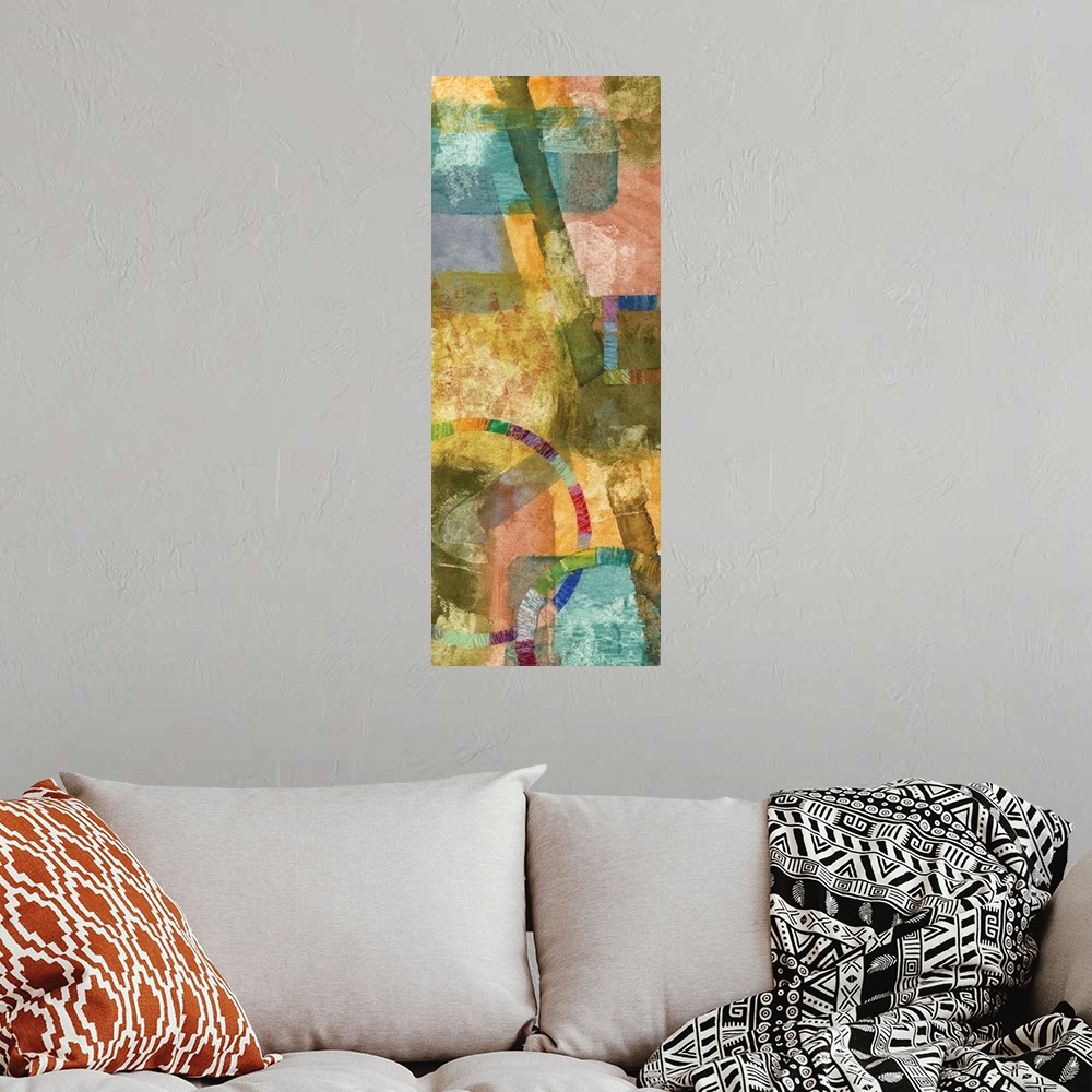 A bohemian room featuring Contemporary abstract art print in cheerful shades of yellow, pink, and blue.