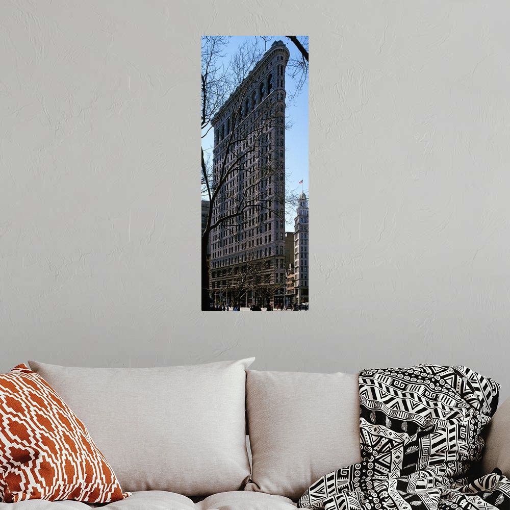 A bohemian room featuring Tall canvas photo of a famous thin building in NYC.