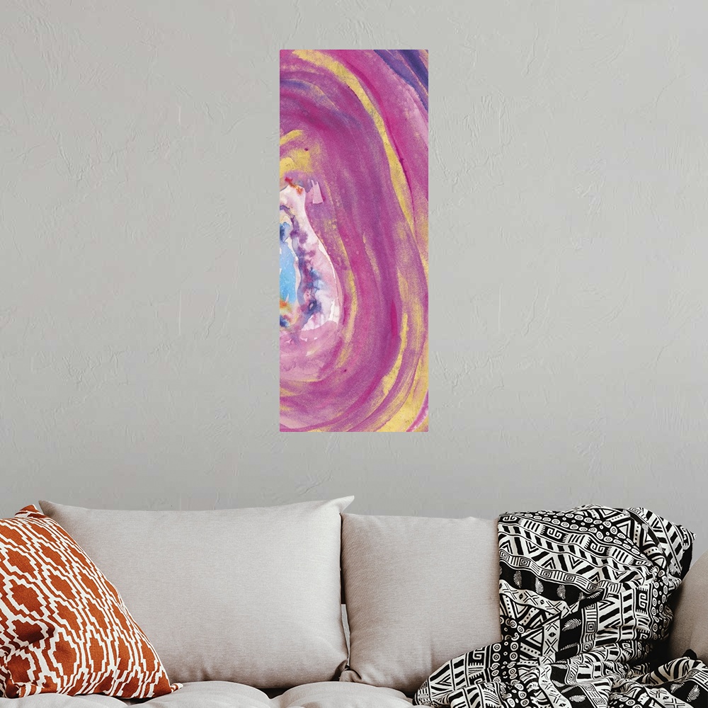 A bohemian room featuring Tall, rectangular abstract painting of the inside of a mineral with pink, purple, blue, and gold ...