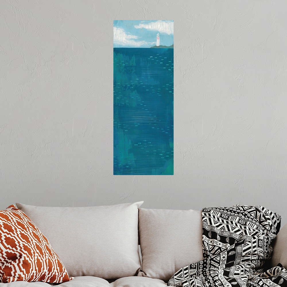 A bohemian room featuring Contemporary artwork of a lighthouse seen in the distance across a dark blue sea.