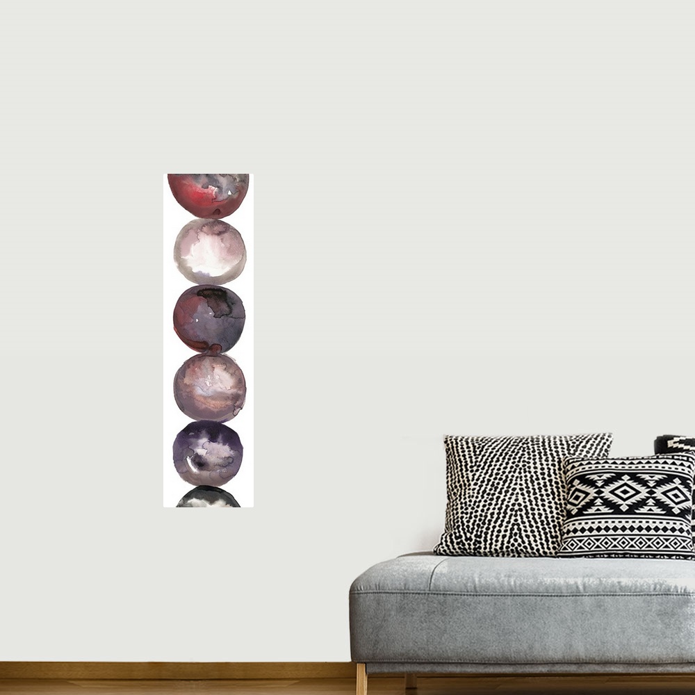 A bohemian room featuring Abstract artwork of a column of circular shapes in shades of grey and red.