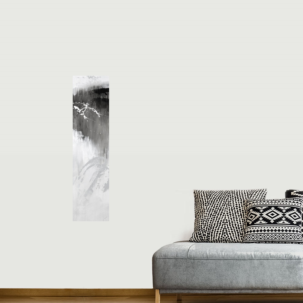 A bohemian room featuring Large vertical abstract painting with bold strokes of paint in white and gray.