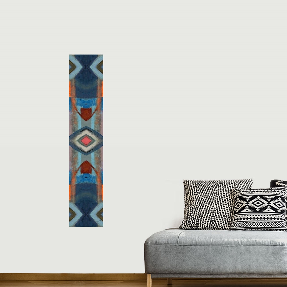 A bohemian room featuring Abstract contemporary painting resembling a kaleidoscopic image, creating geometric forms.