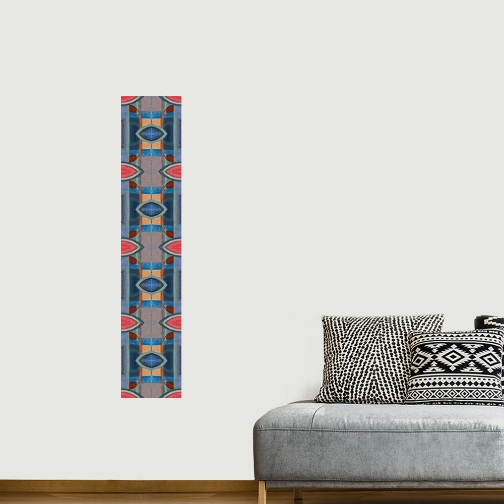 A bohemian room featuring Large symmetrical painting with oblong shaped designs in shades of blue, orange, and pink.