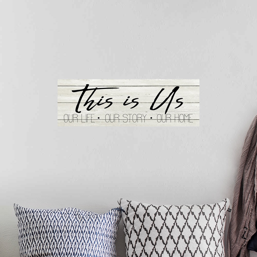A bohemian room featuring "This is Us, Our Life, Our Story, Our Home" on a white wood plank background.