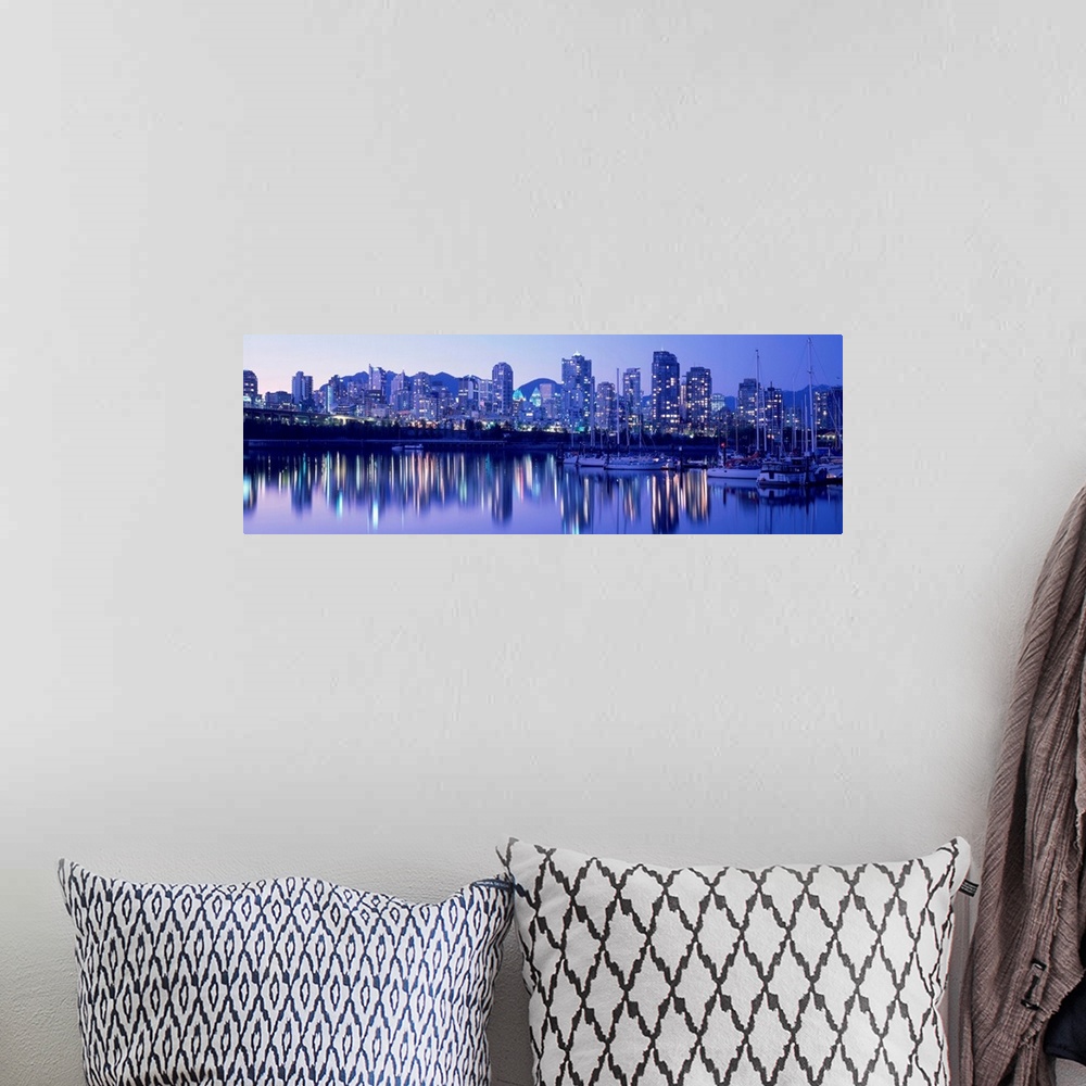 A bohemian room featuring False Creek Skyline, Twilight, Vancouver, British Columbia, Canada