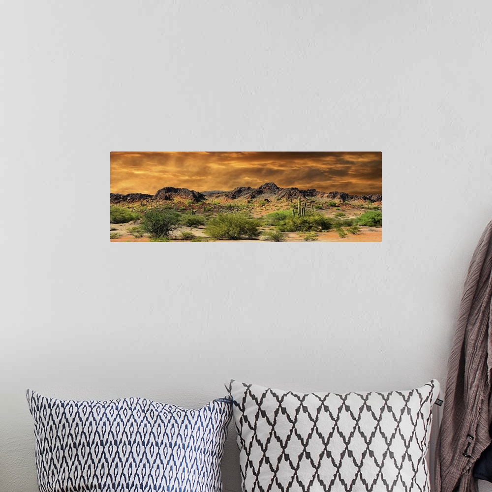 A bohemian room featuring Beautiful panorama of cloud formations and rocky mountains near the border of New Mexico and Mexico.