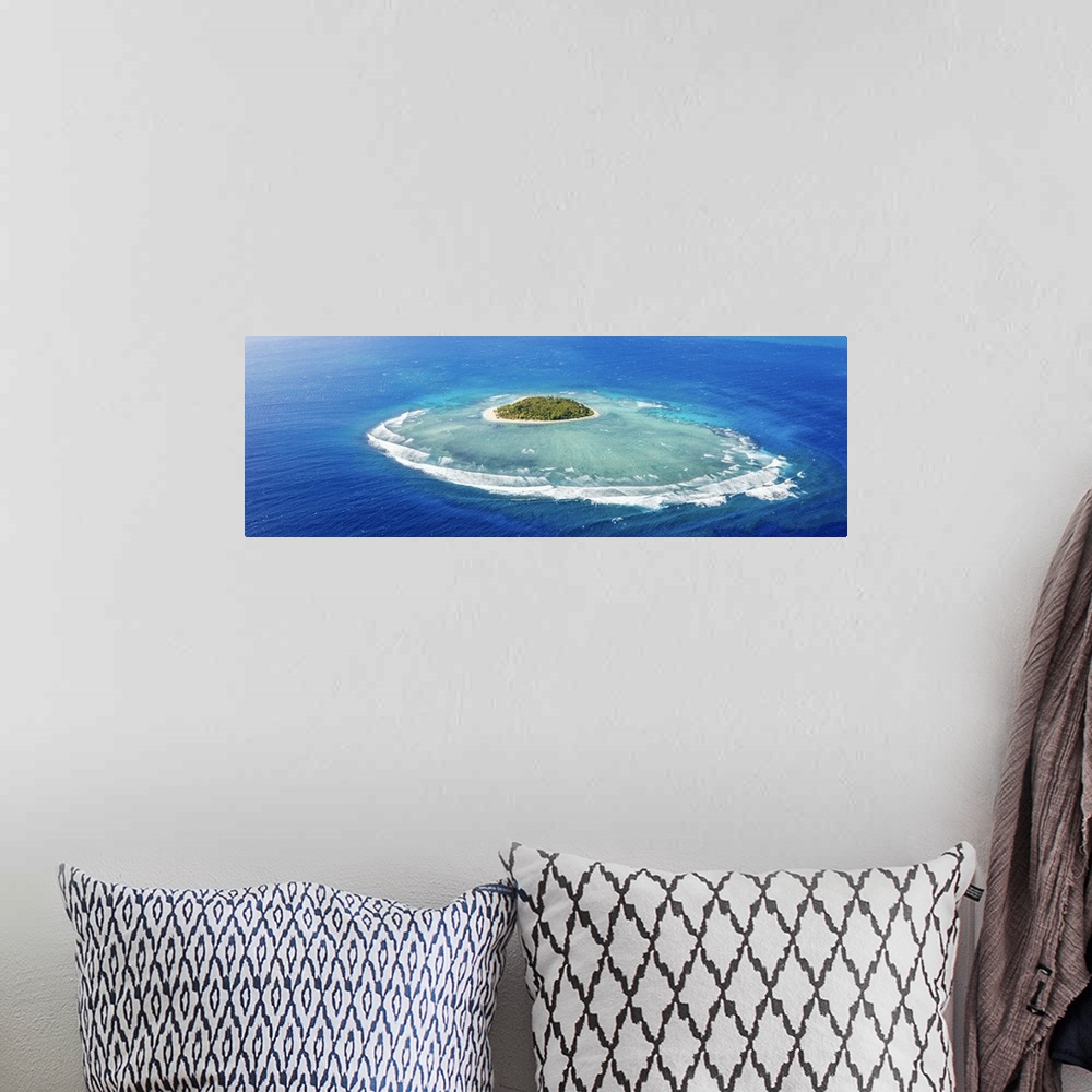 A bohemian room featuring Aerial view of Tavarua, heart shaped island, Mamanucas islands, Fiji.