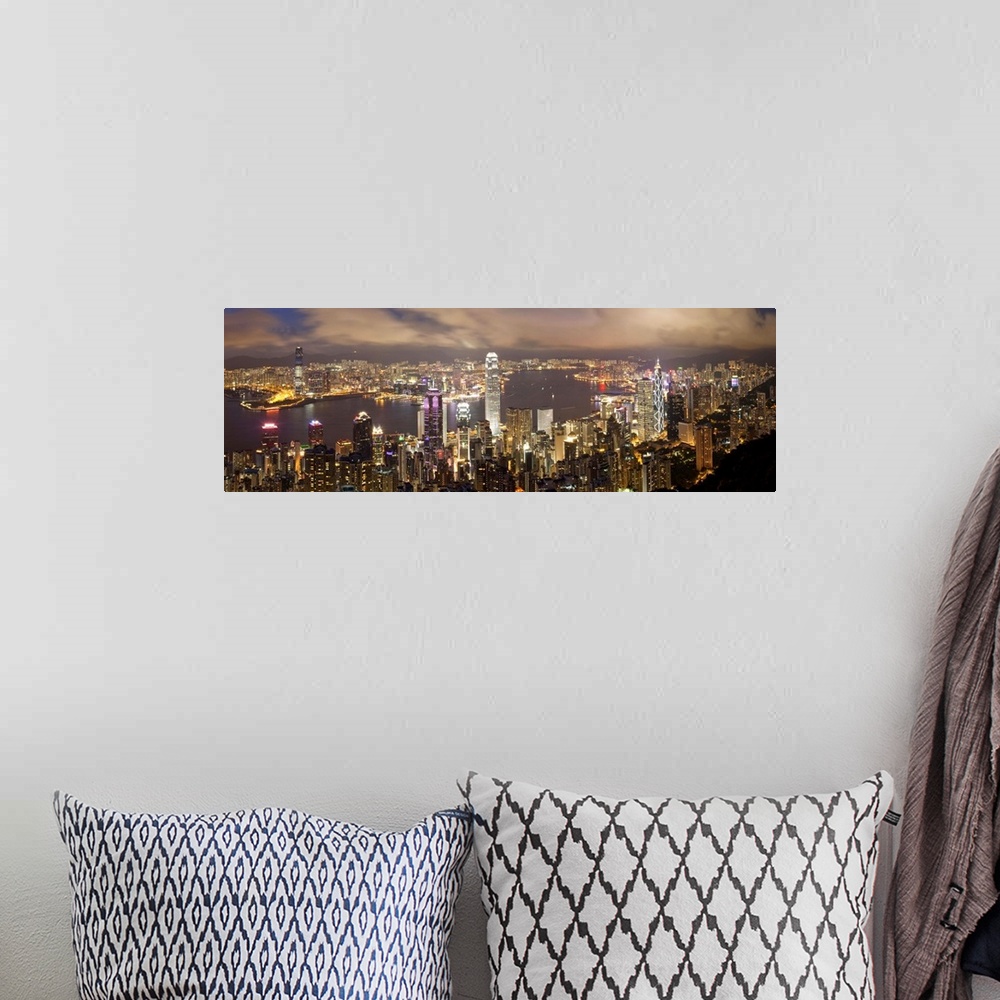 A bohemian room featuring China, Hong Kong, Victoria Peak. View over Hong Kong from Victoria Peak. The illuminated skyline ...