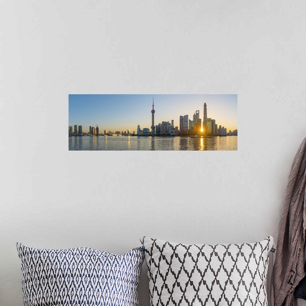 A bohemian room featuring China, Shanghai, Pudong District, Skyline of the Financial District across Huangpu River at sunrise