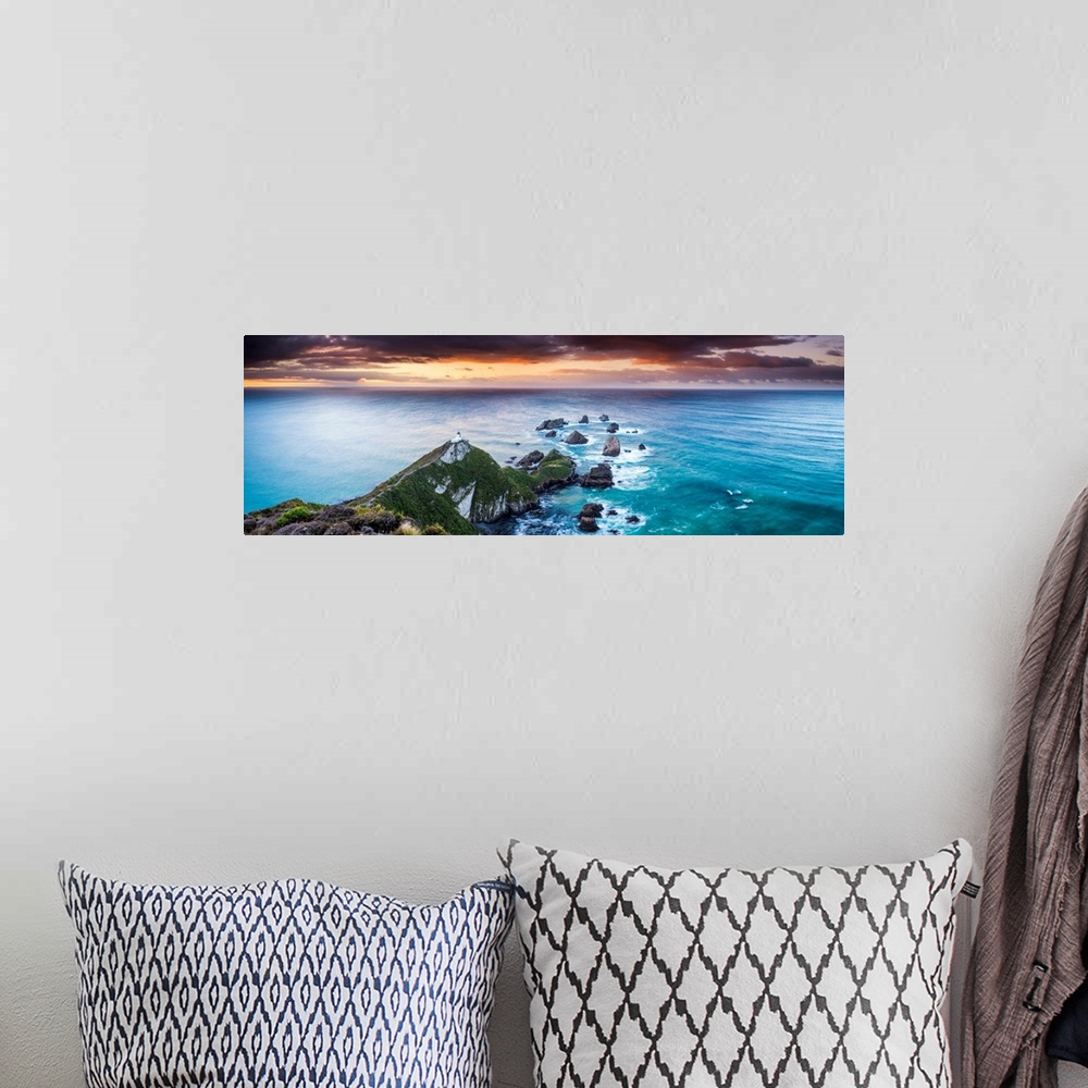 A bohemian room featuring Nugget Point Lighthouse At Sunrise, New Zealand
